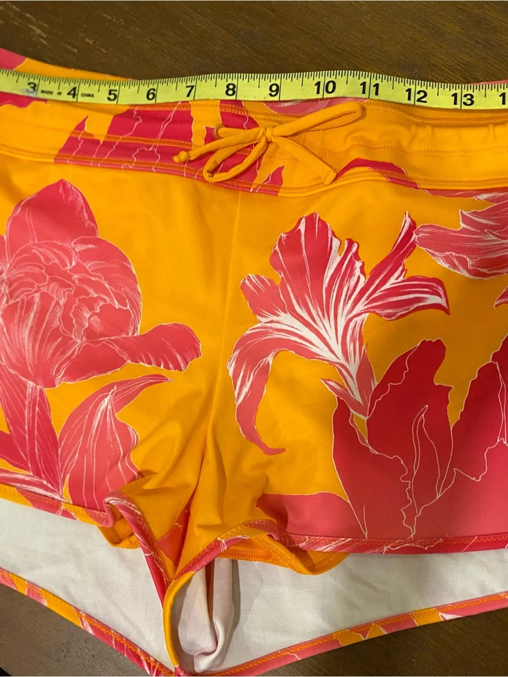 Athleta Yellow Athletic Shorts with Pink Floral Design
